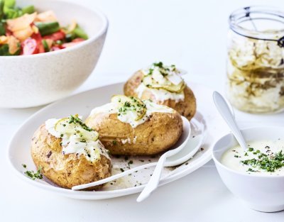Gepofte aardappel met dressing Gepofte aardappel met dressing