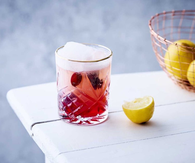 Mocktail met Hoegaarden 0.0 en veenbessen Mocktail met Hoegaarden 0.0 en veenbessen